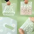 50pcs Die Cut Plastic Merchandise Shopping Bags With Handle, Candy Cake Wrapping Organizer Bags,Wedding Party Gift Bag preview-2