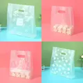 50pcs Die Cut Plastic Merchandise Shopping Bags With Handle, Candy Cake Wrapping Organizer Bags,Wedding Party Gift Bag preview-1