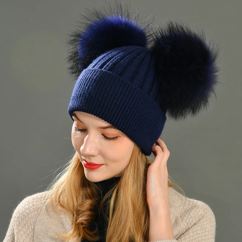 beanie with two fur pom poms