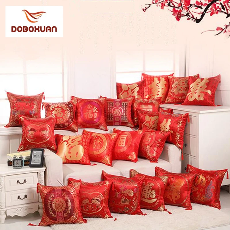 red embroidered pillow