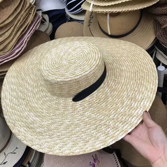 https://ae05.alicdn.com/kf/HTB1MCOKECBYBeNjy0Feq6znmFXah/Women-Natural-Wheat-Straw-Hat-Ribbon-Tie-15cm-Brim-Boater-Hat-Derby-Beach-Sun-Hat-Cap.jpg_640x640.jpg