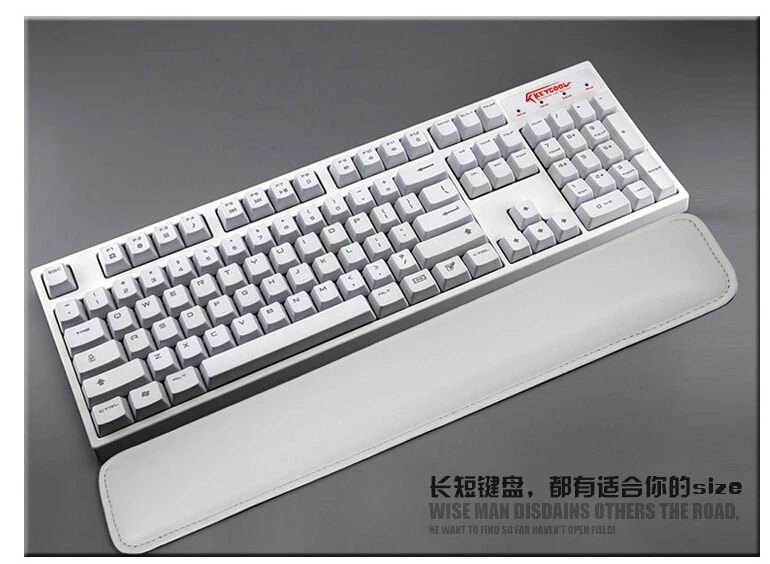 white keyboard with wrist rest