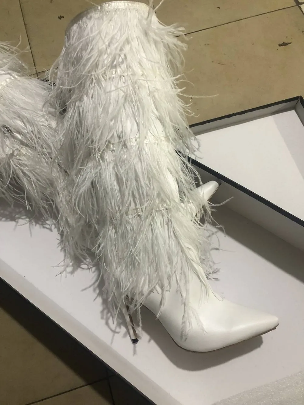 feather thigh high boots