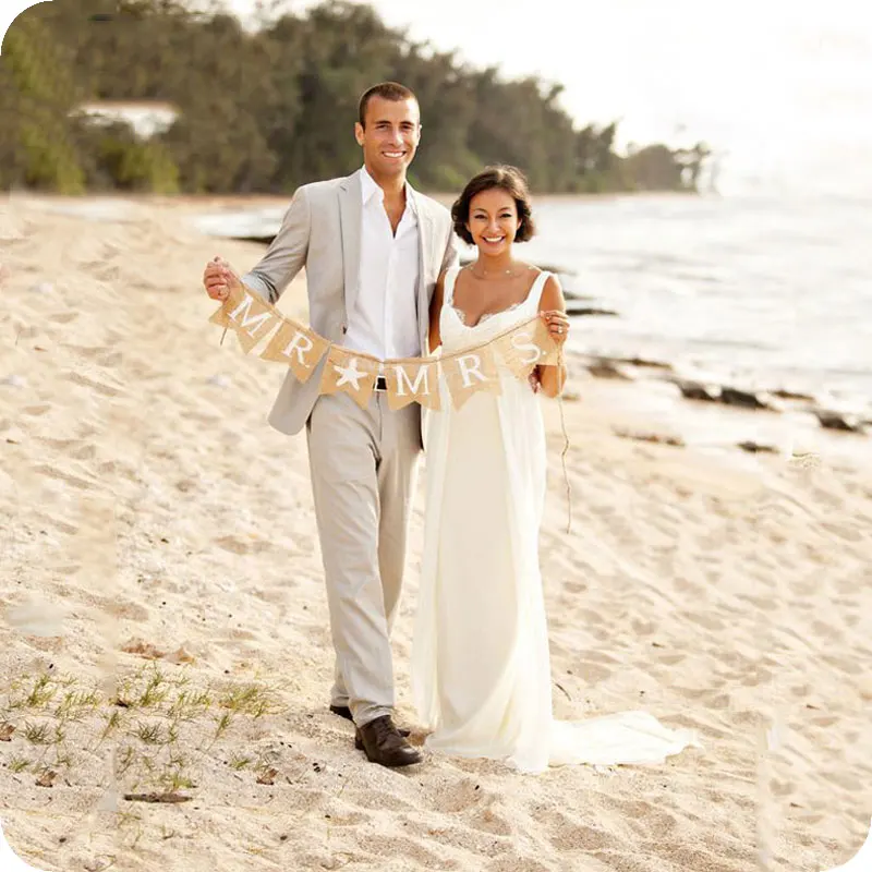 white suit beach wedding