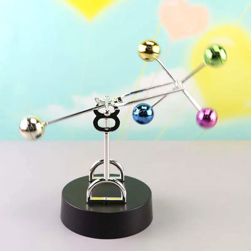 electronic perpetual motion desk toy