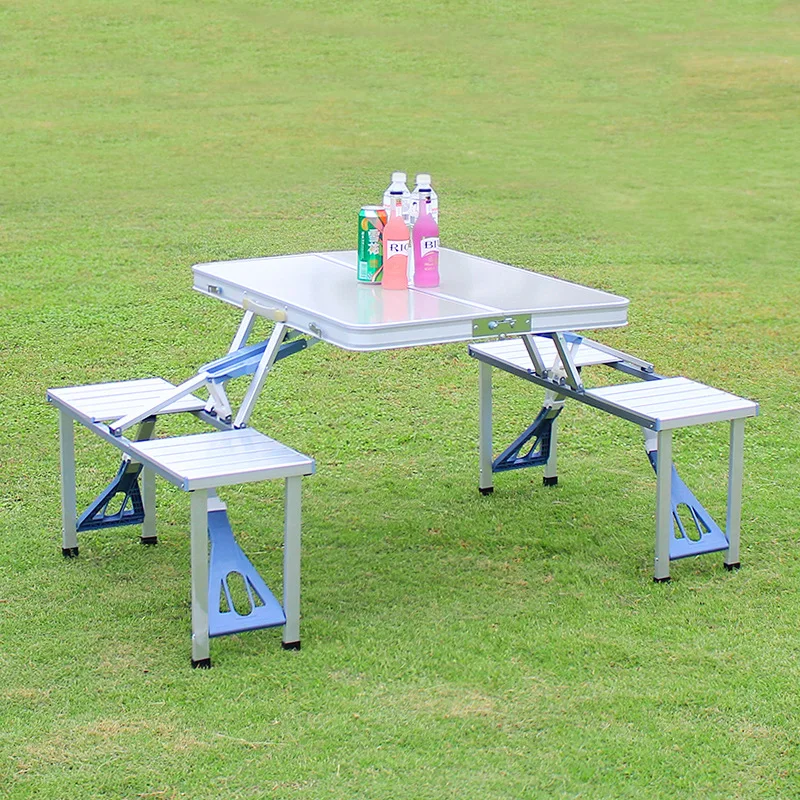 table and chairs with built in fire pit