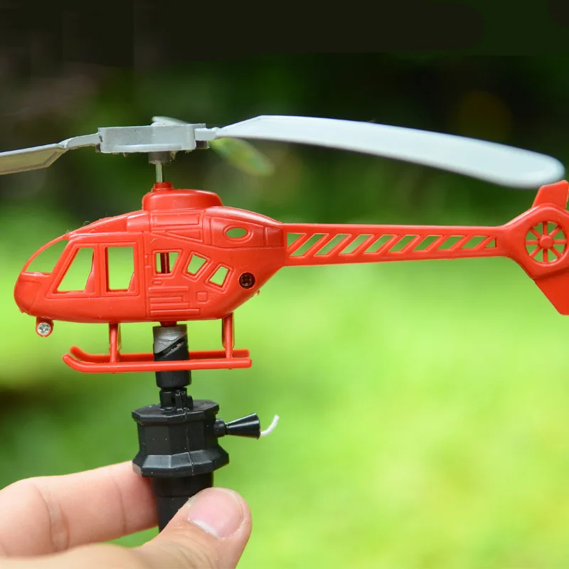 string helicopter toy