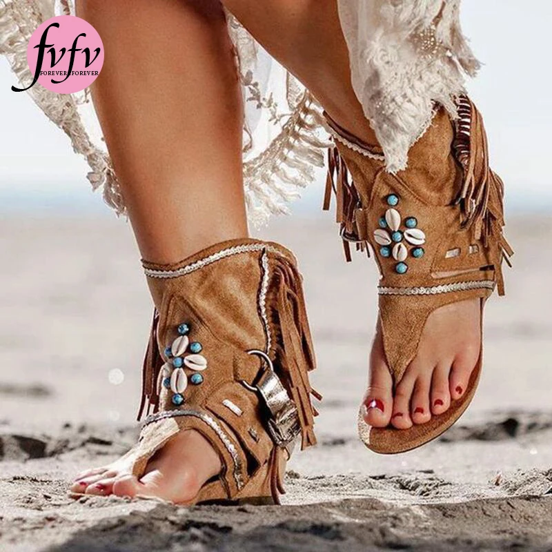 brown sandals with tassels