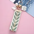 Elegant Leaf Pattern Wristlet Keychain Cute Pearl Shell Pendant With Keyrings and Strap For Women Keys Phones Wallets Decoration preview-3