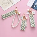 Elegant Leaf Pattern Wristlet Keychain Cute Pearl Shell Pendant With Keyrings and Strap For Women Keys Phones Wallets Decoration preview-1