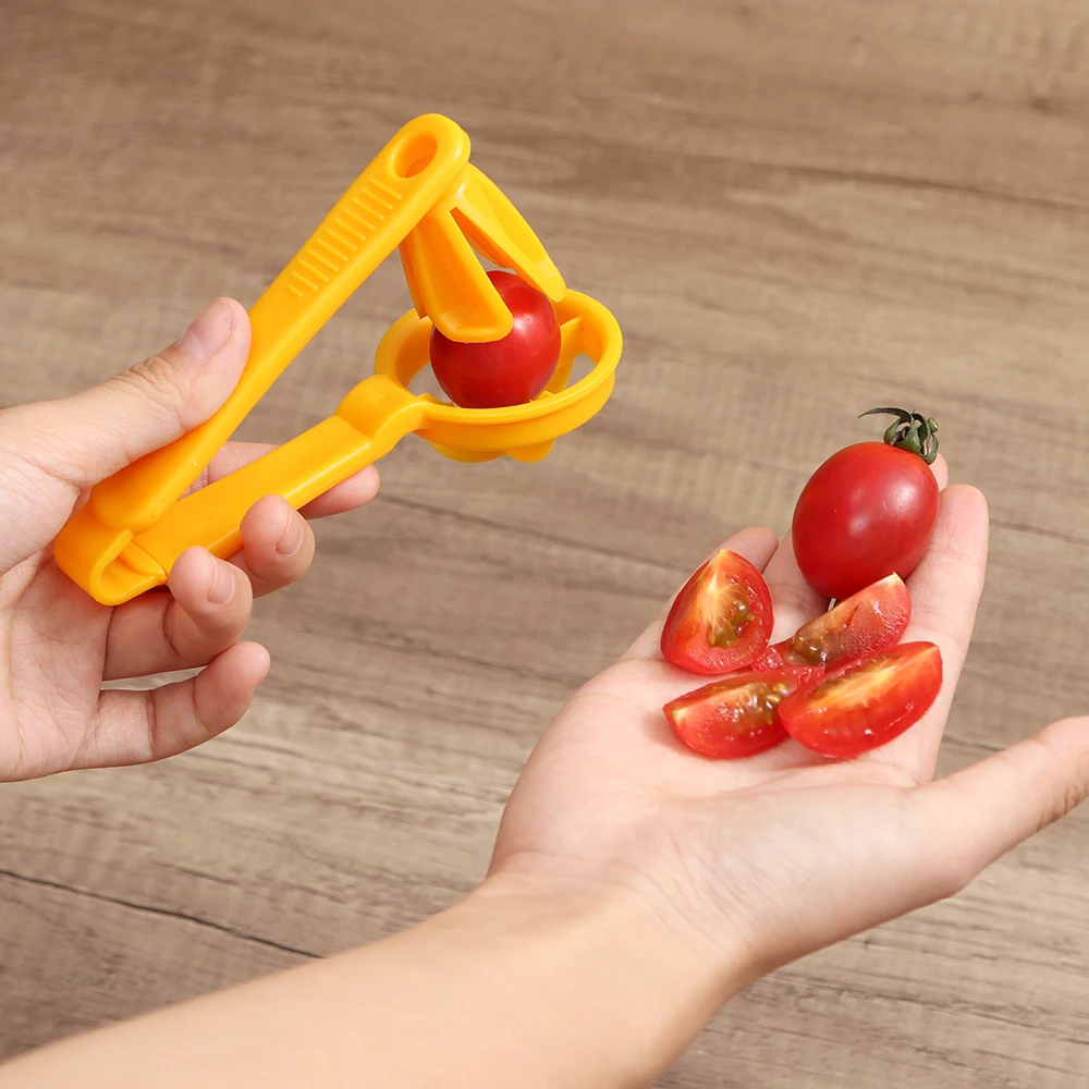 https://ae05.alicdn.com/kf/Sb5c9fe2b3852499e9dbc30473a87f004L/Tomato-Slicer-Cutter-Grape-Tools-Cherry-Kitchen-Pizza-Fruit-Splitter-Artifact-Small-Tomatoes-Accessories-Manual-Cut.jpg