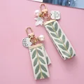 Elegant Leaf Pattern Wristlet Keychain Cute Pearl Shell Pendant With Keyrings and Strap For Women Keys Phones Wallets Decoration preview-2